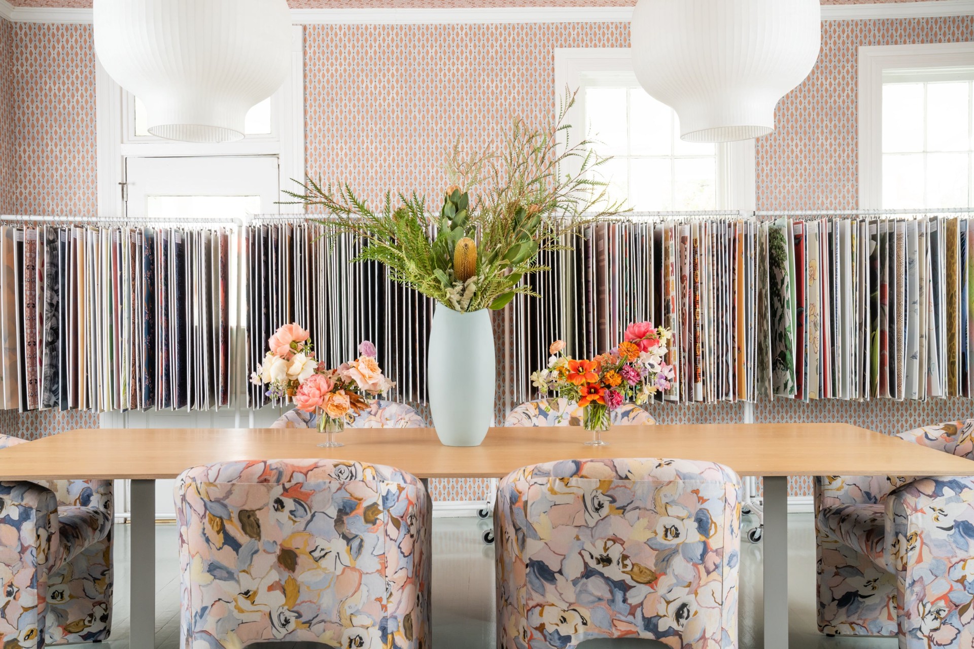 Consult table with floral chairs at SUPPLY Showroom